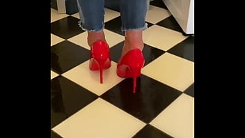 Wetting extremely jeans and red classic high heels and play with pee