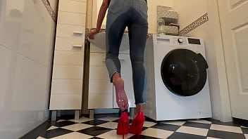 Wetting extremely jeans and red classic high heels and play with pee