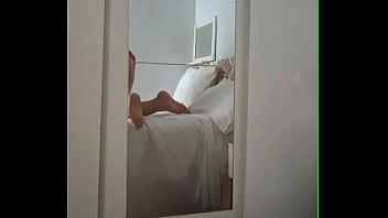 Mom applying cream in just her underwear