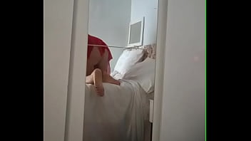 Mom applying cream in just her underwear