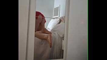 Mom applying cream in just her underwear