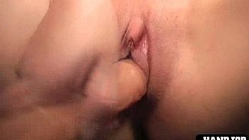 Girl dildoes pussy and plays with cock