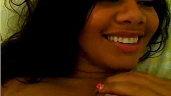 Trini girl sucking her own breasts