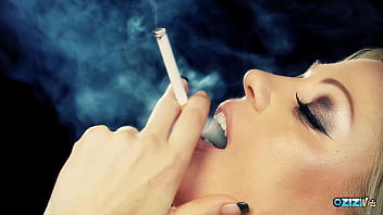 Awesome babes love making out while smoking cigarettes on the sofa Awesome babes love making out while smoking cigarettes on the sofa
