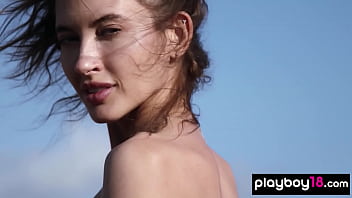 Glamorous exotic beauty introducing her perfect shapes outdoor