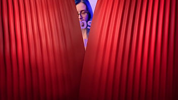 Emo punk girl sucks on a popsicle