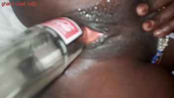 Playing with ebony pussy and fucking it with coka cola bottle