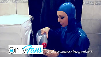 Let's wash laundry dressed in blue latex catsuit