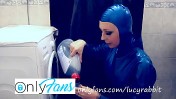 Let's wash laundry dressed in blue latex catsuit