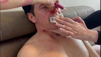 This amuses the two dominant lesbian girls and they film him with their cell phones to publish it on their social media accounts