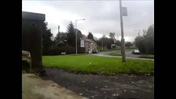 Waiting naked at a bus stop on busy road public nudity