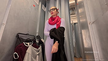 Daring fitting room try on with the curtain left open in public