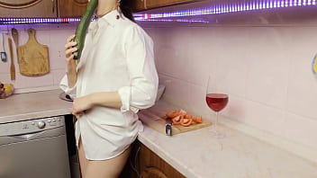 Beauty jerks off with a giant cucumber fucks himself with a vegetable and cums loudly