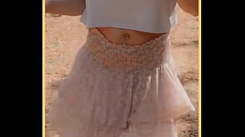 Milf shows her shaved pussy in public