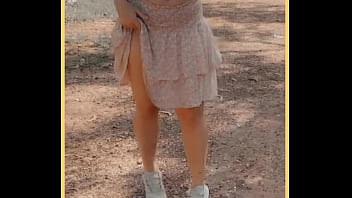 Milf shows her shaved pussy in public