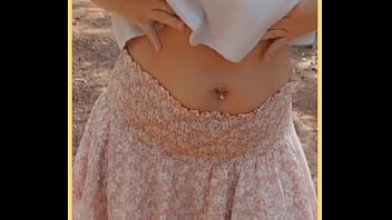 Milf shows her shaved pussy in public