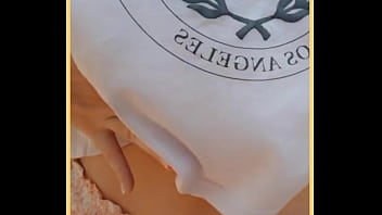 Milf shows her shaved pussy in public