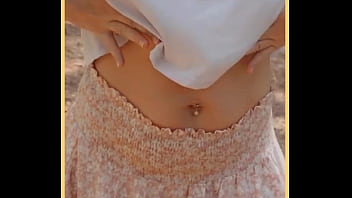 Milf shows her shaved pussy in public