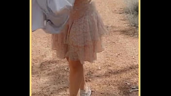 Milf shows her shaved pussy in public