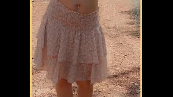 Milf shows her shaved pussy in public