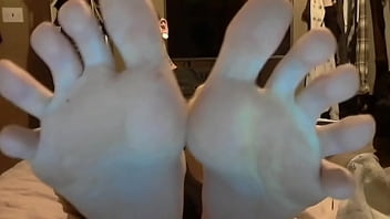 Tattooed man smelly socks