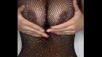 In black lingerie and shiny fishnet bodystrocking claudia bavel