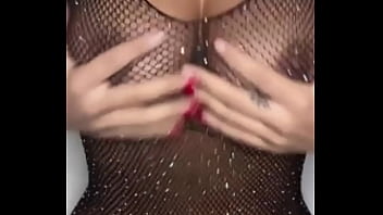 In black lingerie and shiny fishnet bodystrocking claudia bavel