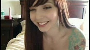 Gorgeous tattoo camgirl fucks pussy closeup