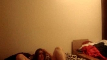 Cam girl sucks her tits