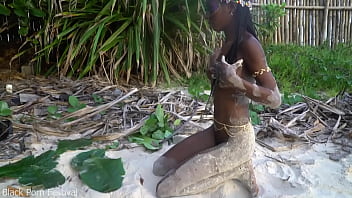 Skinny african tribe girl cooking medecin for her grandmother naked in forrest