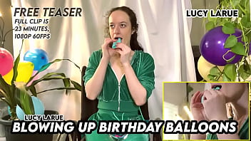 Blowing up birthday balloons