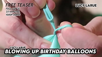 Blowing up birthday balloons