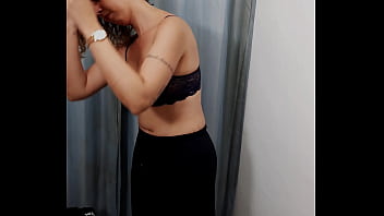 A store dressing room is used by a perverted couple