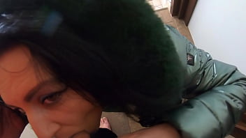 Slutty mature orgasm – blowjob & cum on green shiny downjacket preview