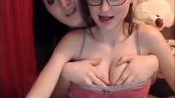 Busty lesbian whore with braces shows tits