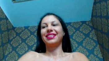 Busty natural brunette masturbates and talks to webcam