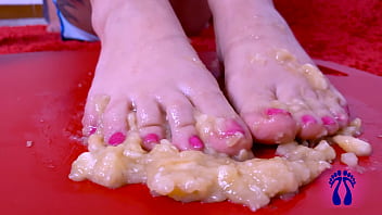 Italian feet steps on creamy banana