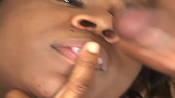 Black babe sucks cock and rides him on the couch