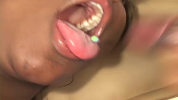 Black babe sucks cock and rides him on the couch