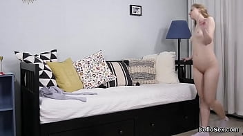 Cute semi naked stunner fondles her spread hymen in closeup