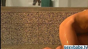 Hot babe soaps up her incredible body