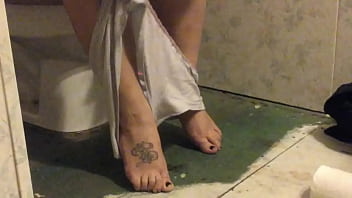 Wife on toilet showing off sexy feet and panties