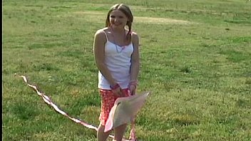 Cute 18yo teen kitty flying a kite