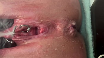 Pee very strong stream from my pierced pussy and my hands in latex glove