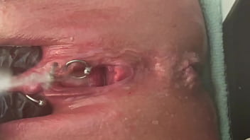 Pee very strong stream from my pierced pussy and my hands in latex glove
