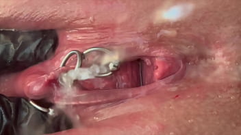 Pee very strong stream from my pierced pussy and my hands in latex glove