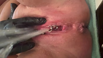 Pee very strong stream from my pierced pussy and my hands in latex glove