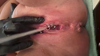Pee very strong stream from my pierced pussy and my hands in latex glove