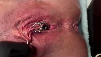 Pee very strong stream from my pierced pussy and my hands in latex glove