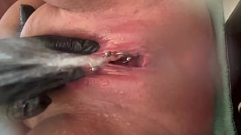 Pee very strong stream from my pierced pussy and my hands in latex glove